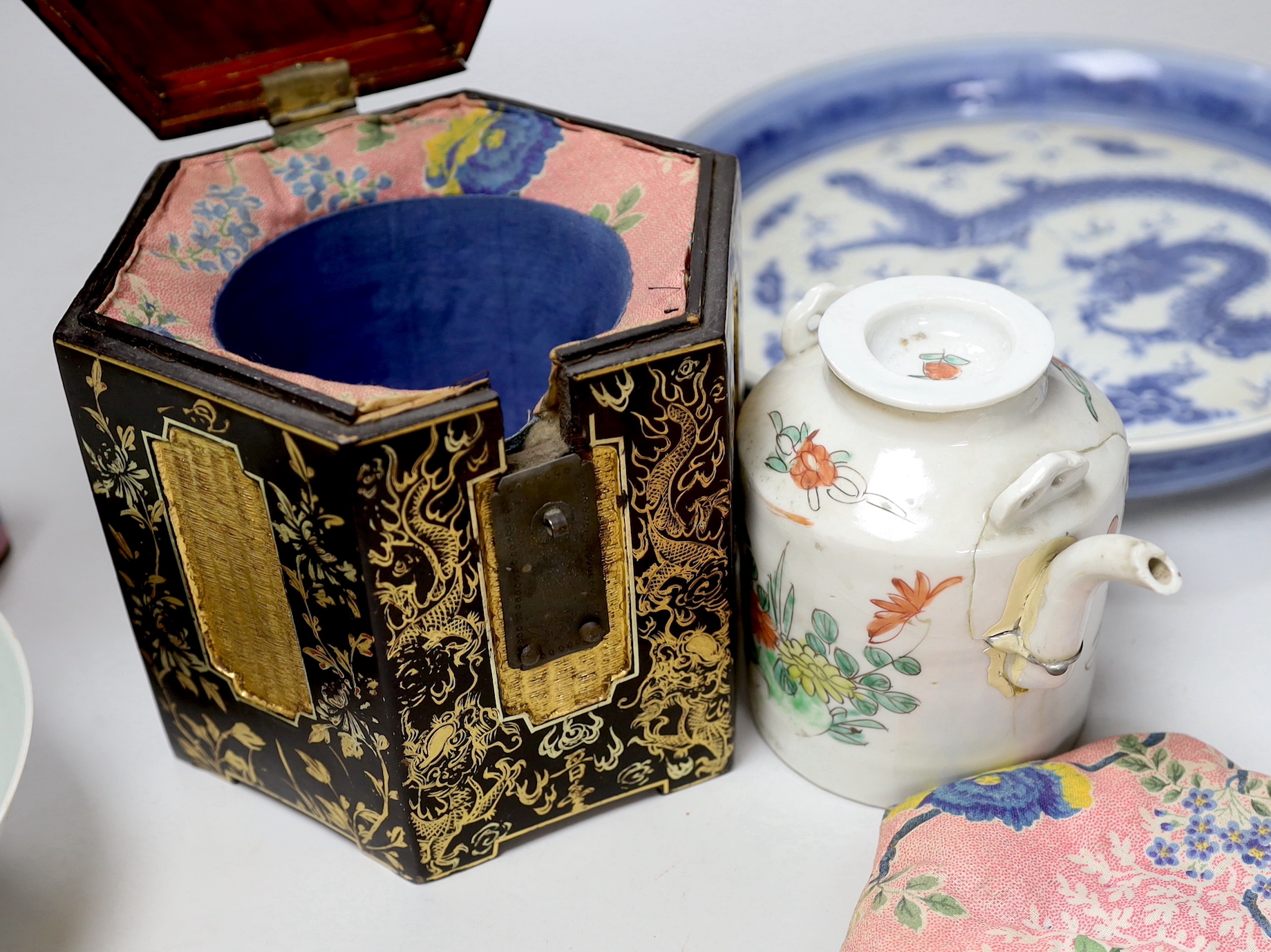 A Chinese blue and white dish, a famille rose bowl, a Canton enamel box and cover and a gilt decorated lacquer box and cover